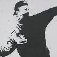 Elusive artist Banksy revealed his identity to a kind schoolboy that helped him