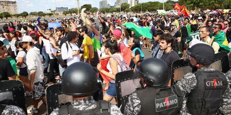 Video: Brazilian protester shows samba skills with a tear gas canister