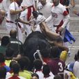 Pic: The Irish lad injured in the Pamplona bull run puts a brave face on it in hospital