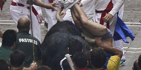 Pic: The Irish lad injured in the Pamplona bull run puts a brave face on it in hospital