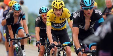 Video: Chris Froome gives a fan a belt for getting too close