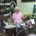 Video: Elderly granny rocks out on a shop floor drum kit