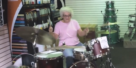 Video: Elderly granny rocks out on a shop floor drum kit