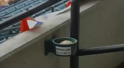 Video: Baseball player hits ball into the crowd and it somehow lands in a cupholder