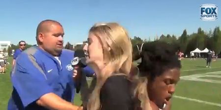 Video: Reporter gets cleaned out by an American football player