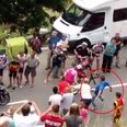 Video: Fan gets tripped while chasing cyclist in the Tour de France