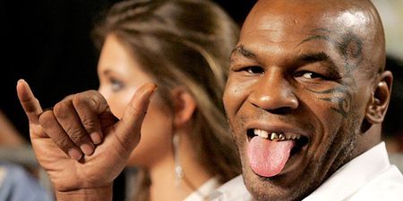 Pic: A far cry from The Hangover, Mike Tyson poses with newlyweds