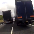 Video: Lane chopping motorcyclist gets sandwiched between two trucks… (NSFW-ish)