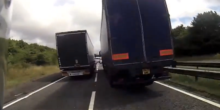 Video: Lane chopping motorcyclist gets sandwiched between two trucks… (NSFW-ish)