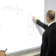 Video: Russian president Vladimir Putin draws a cat’s ass while on school visit