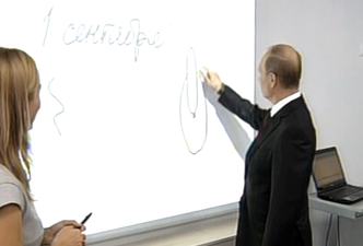 Video: Russian president Vladimir Putin draws a cat’s ass while on school visit