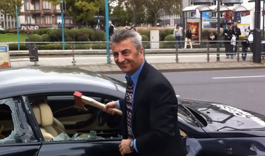 Video: Businessman smashes his own BMW M6 with an axe, because he can…