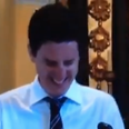 Video: Irish lad comes down with a fit of the giggles during mass