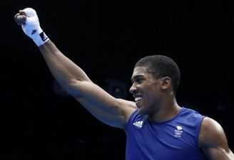 Pic: Ever see a heavyweight boxer with wings before? Get a load of a very ripped Anthony Joshua