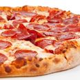 Video: Drunken reveller can’t remember ordering the pizza he’s holding