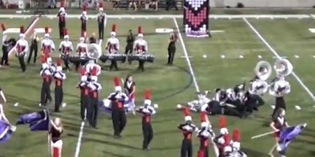 Hilarious marching band fail as tuba players fall on their br-ass