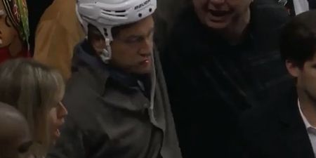 Video: Ice-hockey player gets hit with crunching tackle; has helmet taken off and beer spilt over his head by drunken fans