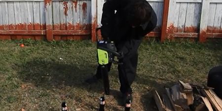 Video: Why use a bottle opener to open a bottle of beer when you can use a chainsaw instead?