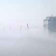 Pic: Amazing shot of London skyscrapers poking through a thick fog