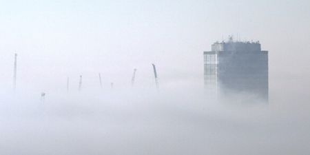 Pic: Amazing shot of London skyscrapers poking through a thick fog