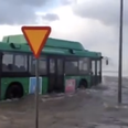 Video: Swedish bus driver takes on a flood… and wins