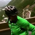 Video: Daredevil cyclist rides bike down steep hill at 50 miles per hour… backwards