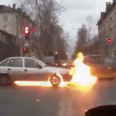 Video: Dash-cam captures the moment a car spontaneously combusts on Ukrainian road