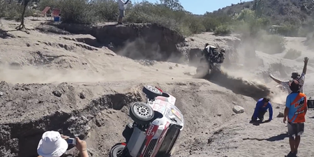 Video: Small ridge causes three rollovers in a row at the Dakar Rally