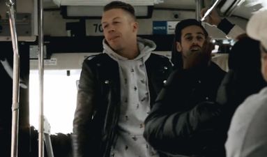 Video: Macklemore gives a surprise concert on a bus