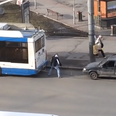 Video: Watch as two Russian guys attempt to hitch a broken down car to a public bus