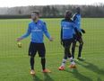 Pics: Wilshere and Flamini argue during training at Arsenal