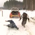 Video: Rally driver drags a helpful spectator to the ground