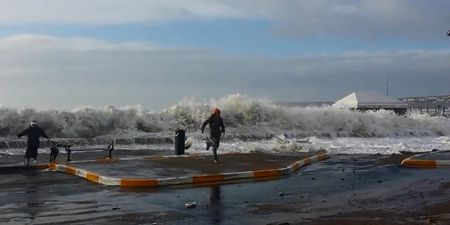Video: These huge waves forced pedestrians to flee the footpath in Tramore this morning