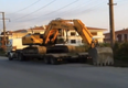Video: Trucker rows to safety using excavator after running out of fuel