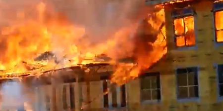Video: Fire crews stage incredibly dramatic rescue of construction worker from burning apartment building in Texas
