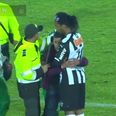Video: Fan runs onto pitch and gives Ronaldinho a big hug