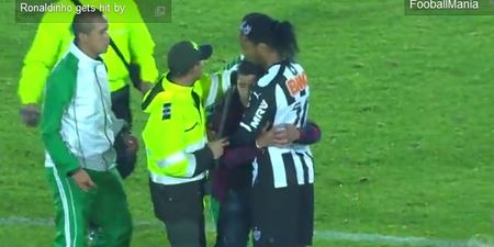 Video: Fan runs onto pitch and gives Ronaldinho a big hug
