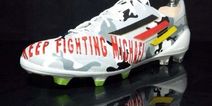 Pic: Lukas Podolksi to show support for Michael Schumacher with these boots at Wembley today