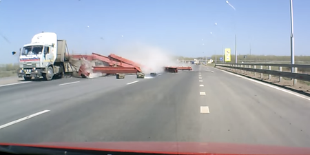 Video: Truck spills load into oncoming traffic
