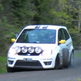 Video: Cameraman hit hard by runaway rally car wheel