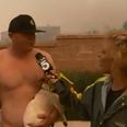 Video: Attractive reporter covering outbreak of wildfires gets asked out live on air by a topless guy holding a dog