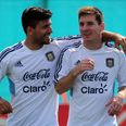 Video: Lionel Messi and Sergio Aguero play some outrageous keepy-uppys over a fence