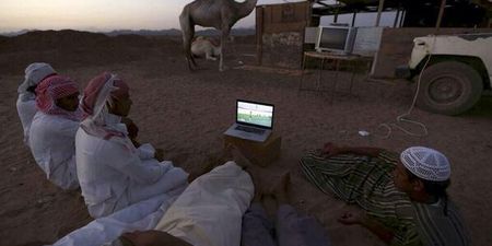 Sitting back, watching the football, relaxing, Saudi-style