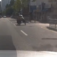 Video: Korean biker drags traffic cop 200m after failing to accept a ticket