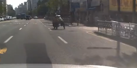 Video: Korean biker drags traffic cop 200m after failing to accept a ticket
