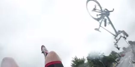 Video: Wow! This cyclist crashed into a car, flipped through the air and landed perfectly on his feet