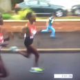 Vine: Little boy joins in with the marathon runners at Commonwealth Games