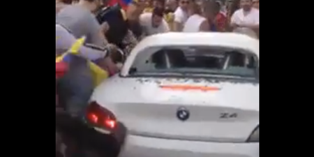 Video: Watch as rowdy Colombian football fans smash up a BMW Z4 in New York