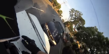 Video: Biker lands on car roof after being hit from behind