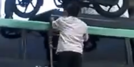 Video: Indian men loading motorbike onto bus roof is the most impressive thing you’ll see today